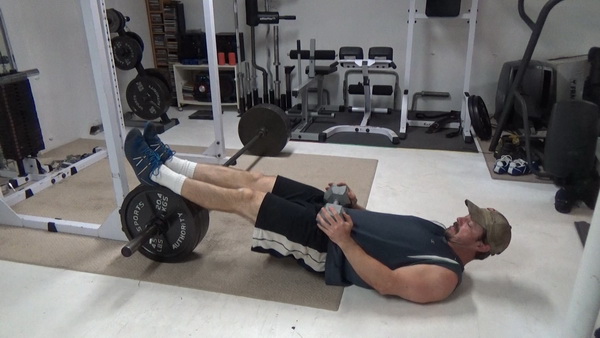 Roll-Up Barbell Plate Leg Curls Weighted Start