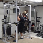 Standing Barbell-Braced Dumbbell Shoulder Press